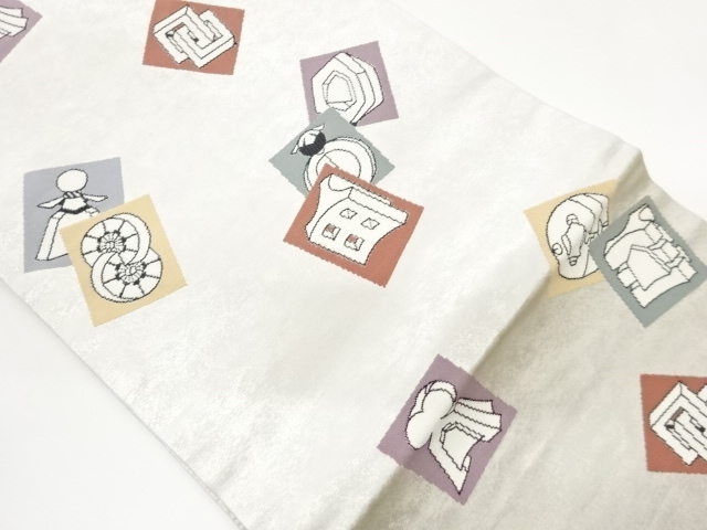 引箔色紙に玩具模様織出し名古屋帯